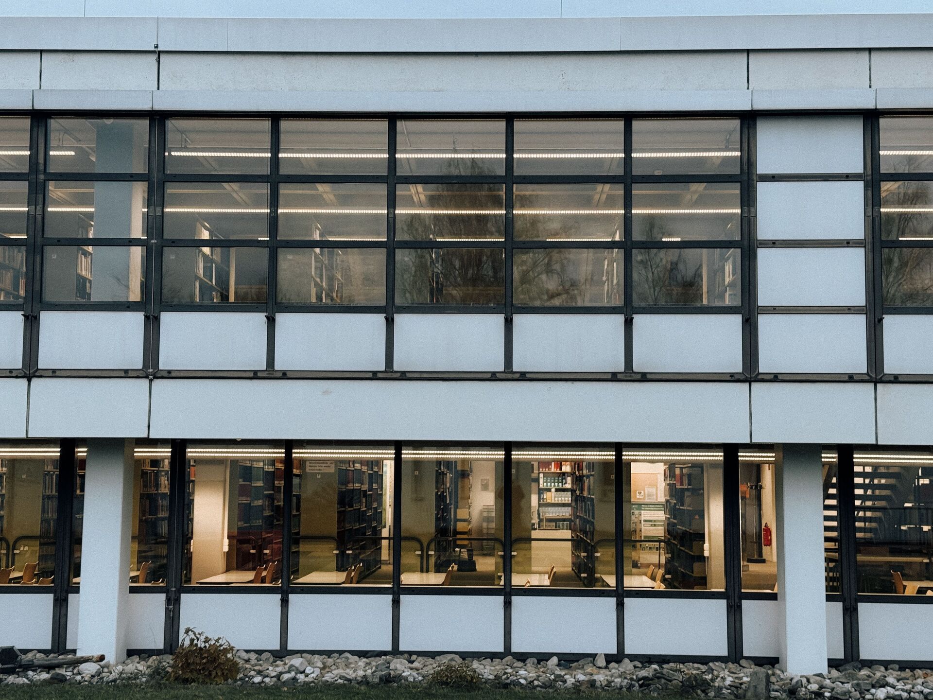Modern public library exterior with glass facade